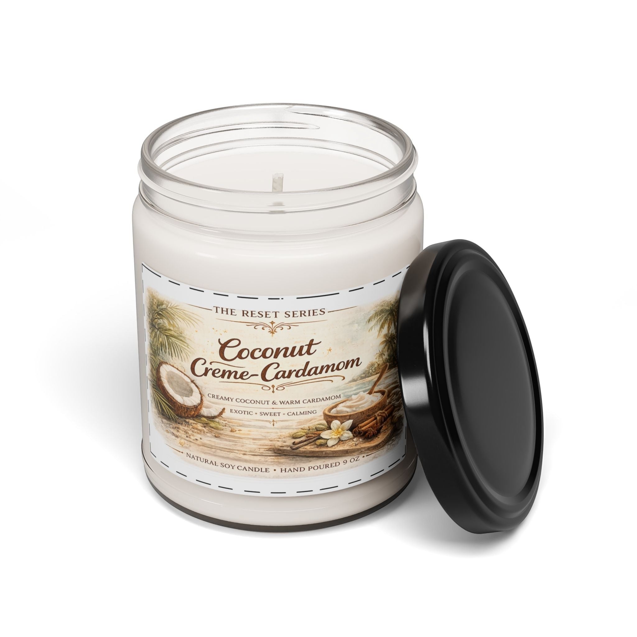 Jena Jewelry Coconut Cardamom soy candle in a clear glass jar with a black lid. Tropical design with coconut and cardamom.