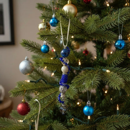 Jena Jewelry handcrafted festive icicle ornament with blue beads, silver accents, and a crystal drop.