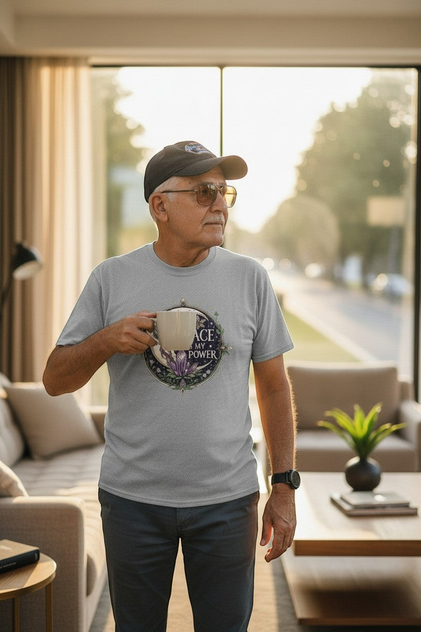 Jena Jewelry light grey 100% cotton t-shirt with a spiritual graphic featuring a moon, dove, and botanical wreath. Text reads "Peace Is My Power."