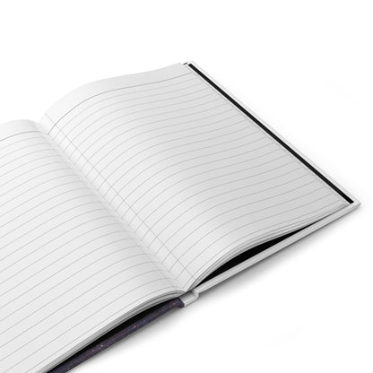 Jena Jewelry guided journal with lined pages and a dark, speckled cover, perfect for personal growth and reflection.