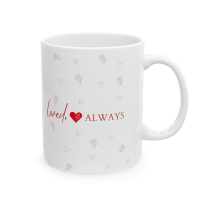 Jena Jewelry white ceramic mug with "Loved Always" text, red heart, and rose pattern. Ideal for gifts.