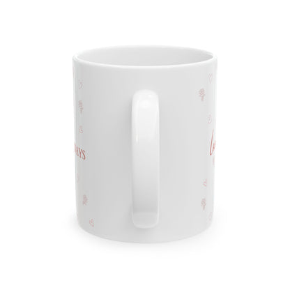 Jena Jewelry white ceramic mug with red "Loved Always" text and heart and rose illustrations. Ideal for gifts.