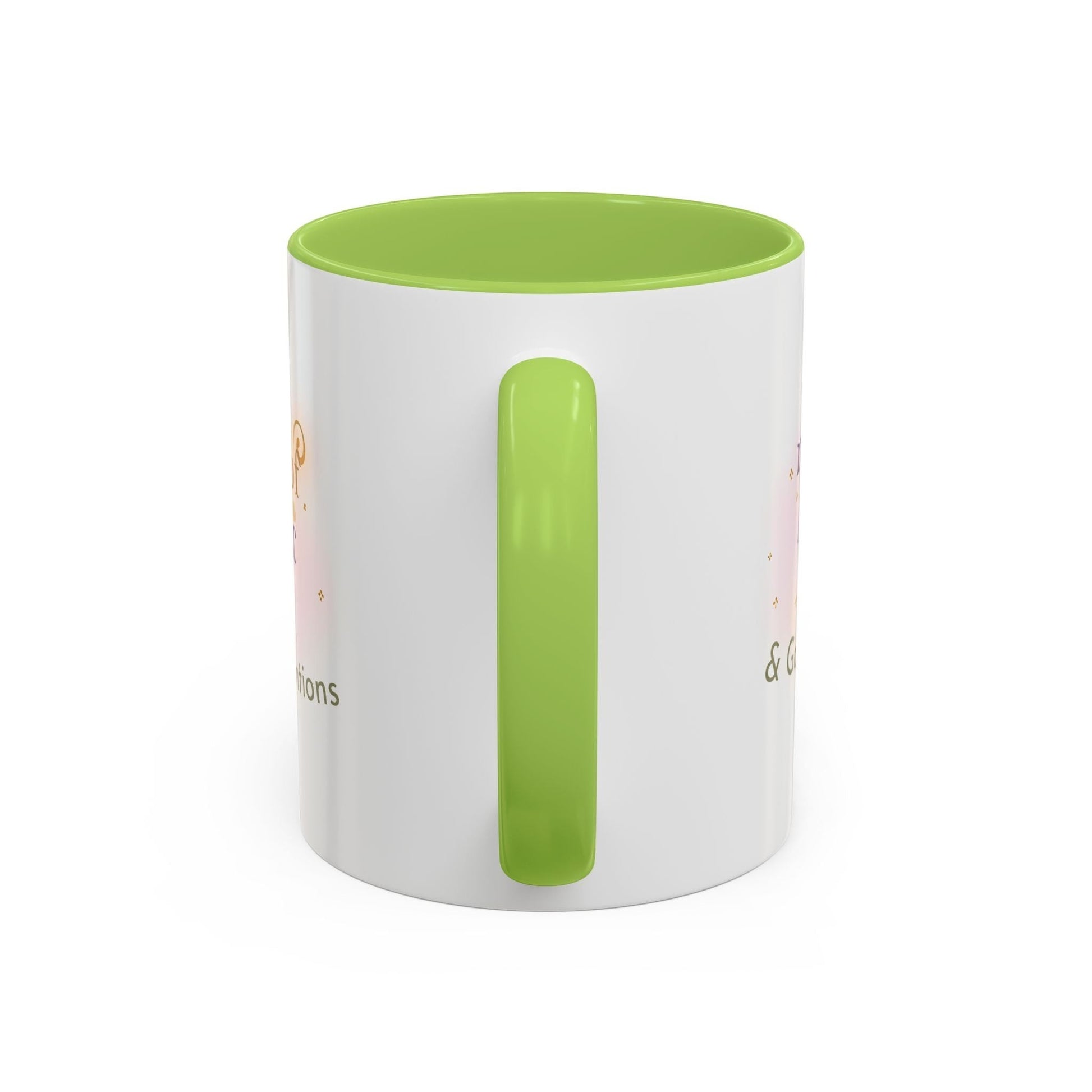 Jena Jewelry white ceramic mug with green interior and handle, featuring "Made of Magic" affirmation text and watercolor design.