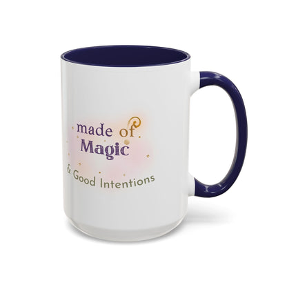 Jena Jewelry white ceramic mug with navy blue interior and handle, featuring "Made of Magic & Good Intentions" text.