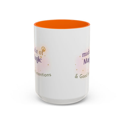 Jena Jewelry white ceramic mug with orange interior, featuring "Made of Magic" text and watercolor accents for positive energy.