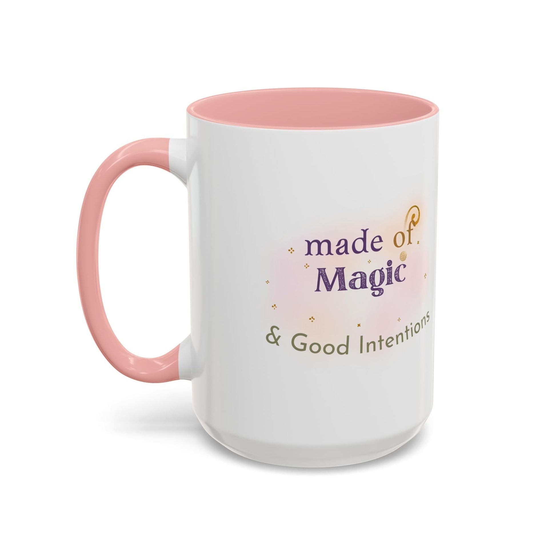 Jena Jewelry white ceramic mug with pink handle and interior, featuring "Made of Magic & Good Intentions" text.