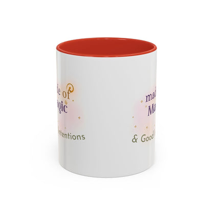 Jena Jewelry white ceramic mug with red interior, featuring the text "Made of Magic" and "Set Intentions & Good Vibes" with watercolor accents.