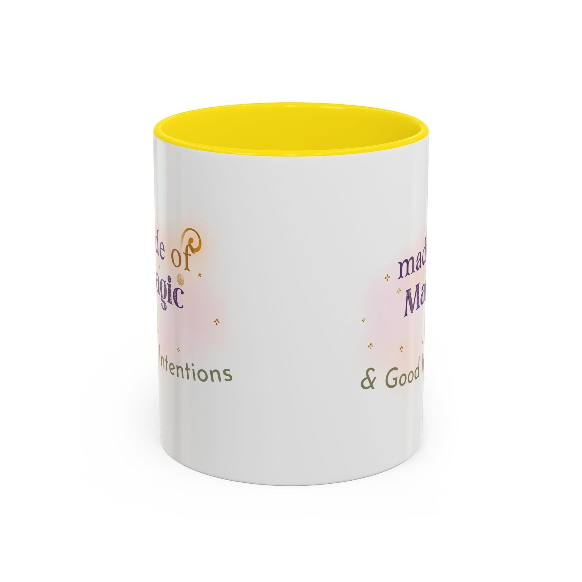 Jena Jewelry white ceramic mug with yellow interior, featuring "Made of Magic" affirmation text and watercolor accents.