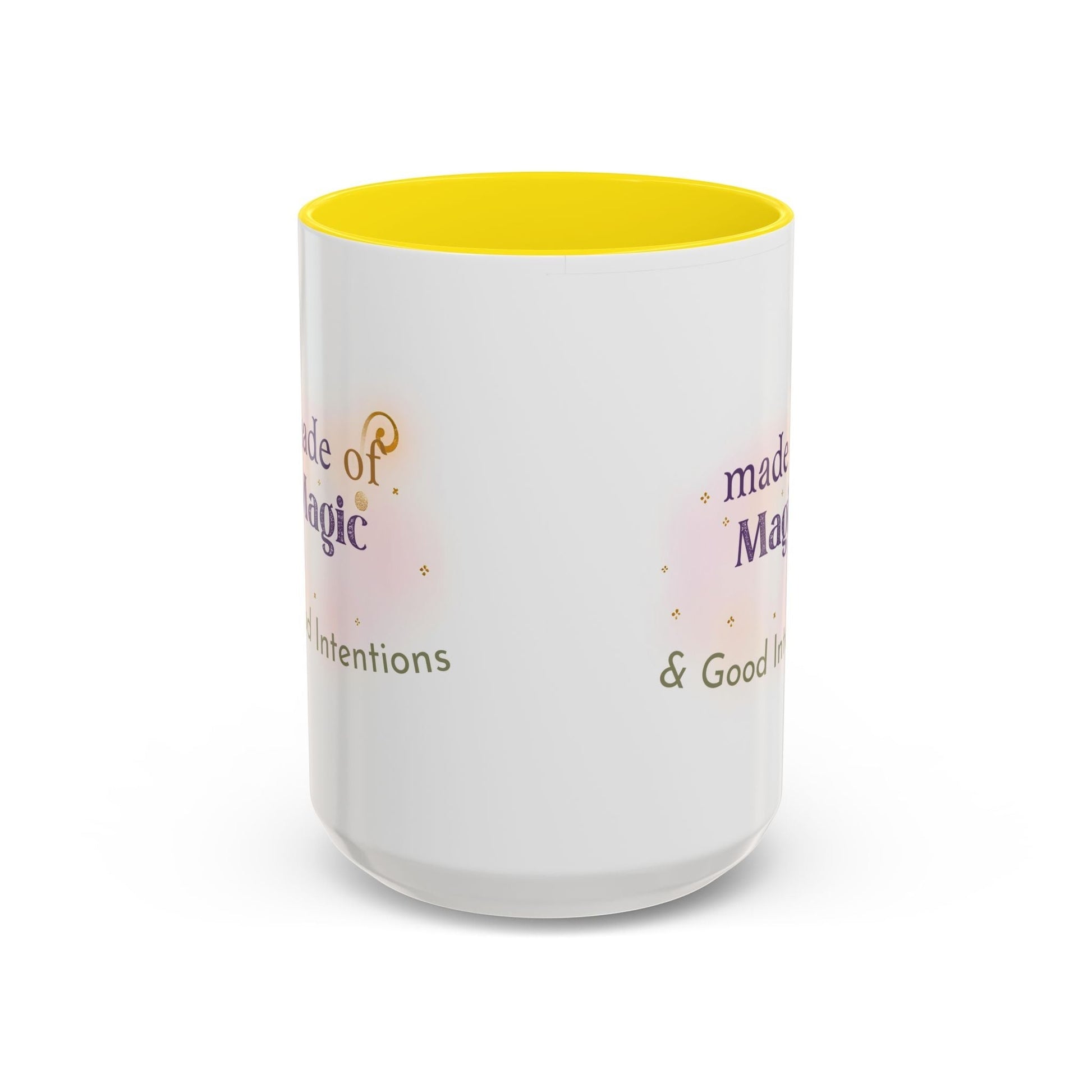 Jena Jewelry white ceramic mug with yellow interior, featuring the text "Made of Magic" and "Filled Intentions & Good Intentions" in purple and green.