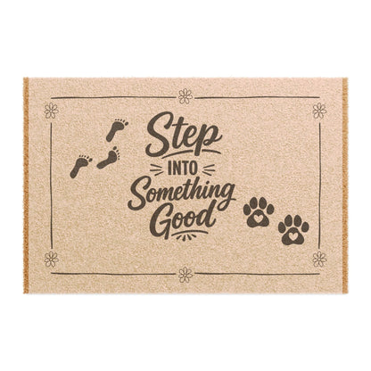 Jena Jewelry natural coir doormat with "Step Into Something Good" text, footprints, and paw prints.