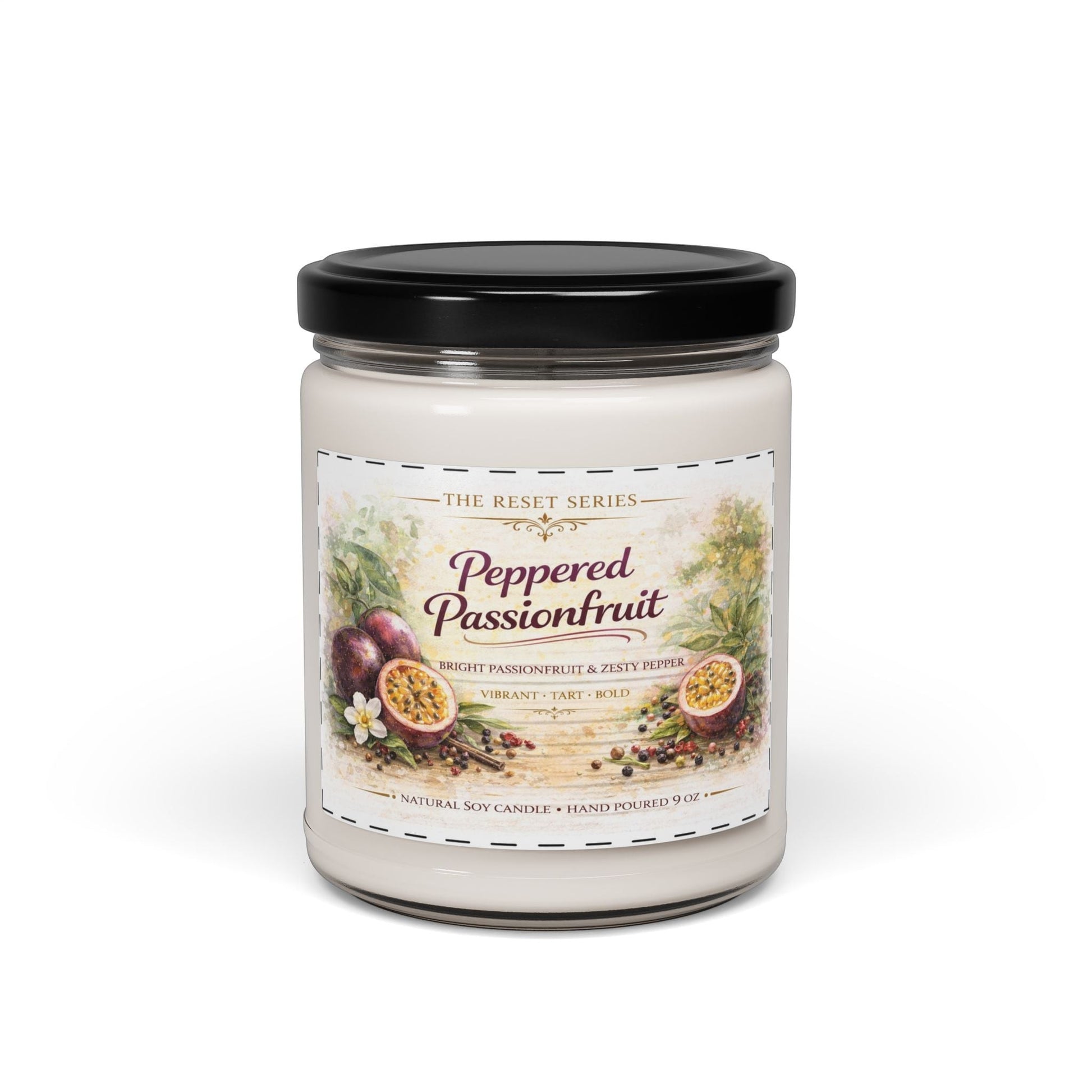 Jena Jewelry Peppered Passionfruit natural soy candle in a clear glass jar with a black lid. Features a label with passionfruit illustrations and scent notes.