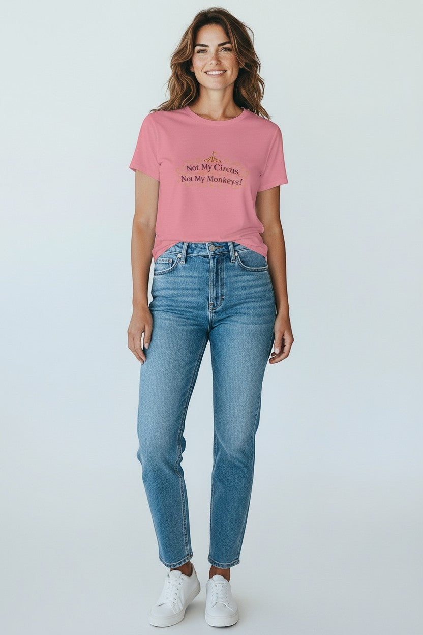 Jena Jewelry pink cotton tee with "Not My Circus, Not My Monkeys!" graphic print. Model wears jeans and sneakers.