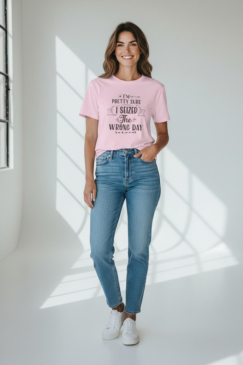 Jena Jewelry light pink 100% cotton t-shirt with a sarcastic graphic print that reads "I'm pretty sure I seized the wrong day."