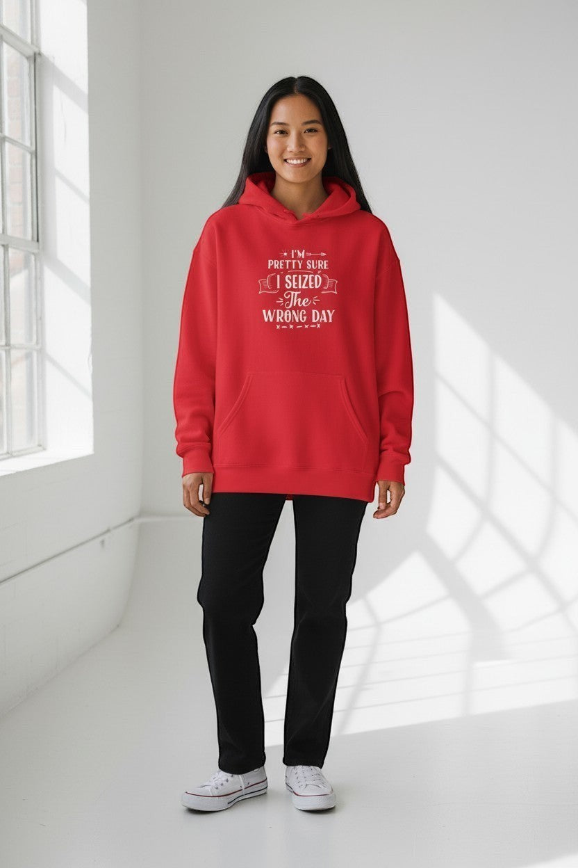 Jena Jewelry red cotton-poly blend hoodie with "I’m Pretty Sure I Seized the Wrong Day" graphic print, featuring a pouch pocket and hood.