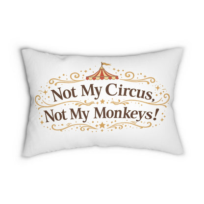 White lumbar pillow with "Not My Circus, Not My Monkeys!" text in brown and gold circus-themed font. Jena Jewelry.