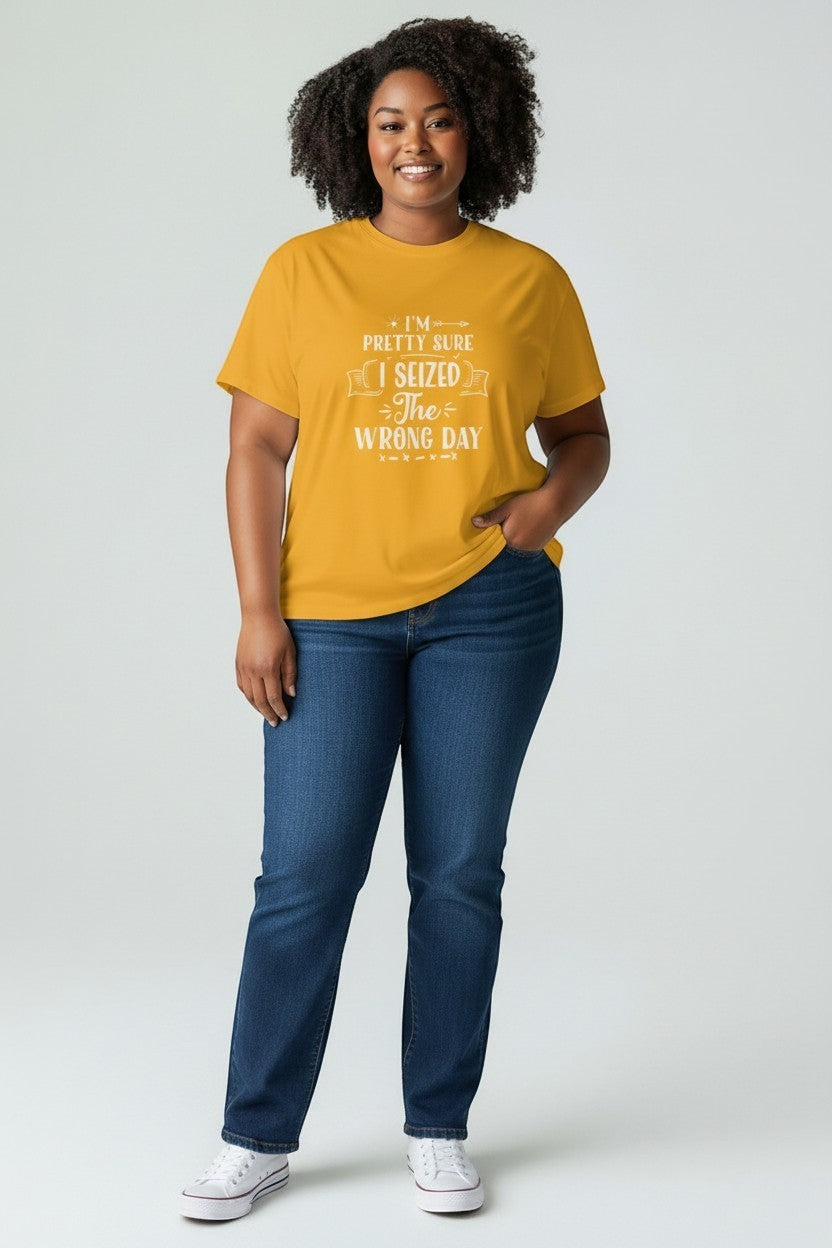 Jena Jewelry mustard yellow cotton t-shirt with white text graphic that reads 'I'm pretty sure I seized the wrong day'.