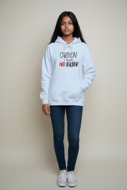Woman wearing light blue “Caution I Have No Filter” hoodie, a clean and casual sweatshirt for everyday style.