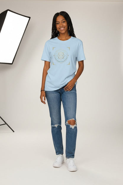 Woman wearing light blue sacred geometry t-shirt, a calm and uplifting casual style.