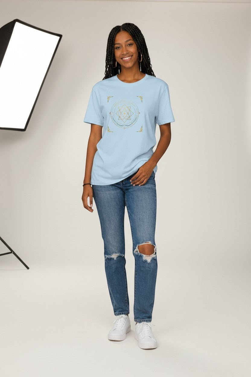 Woman wearing light blue sacred geometry t-shirt, a calm and uplifting casual style.