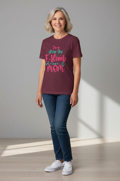 Woman wearing maroon “Drop the F-Bomb Mom” t-shirt, a confident and playful look.