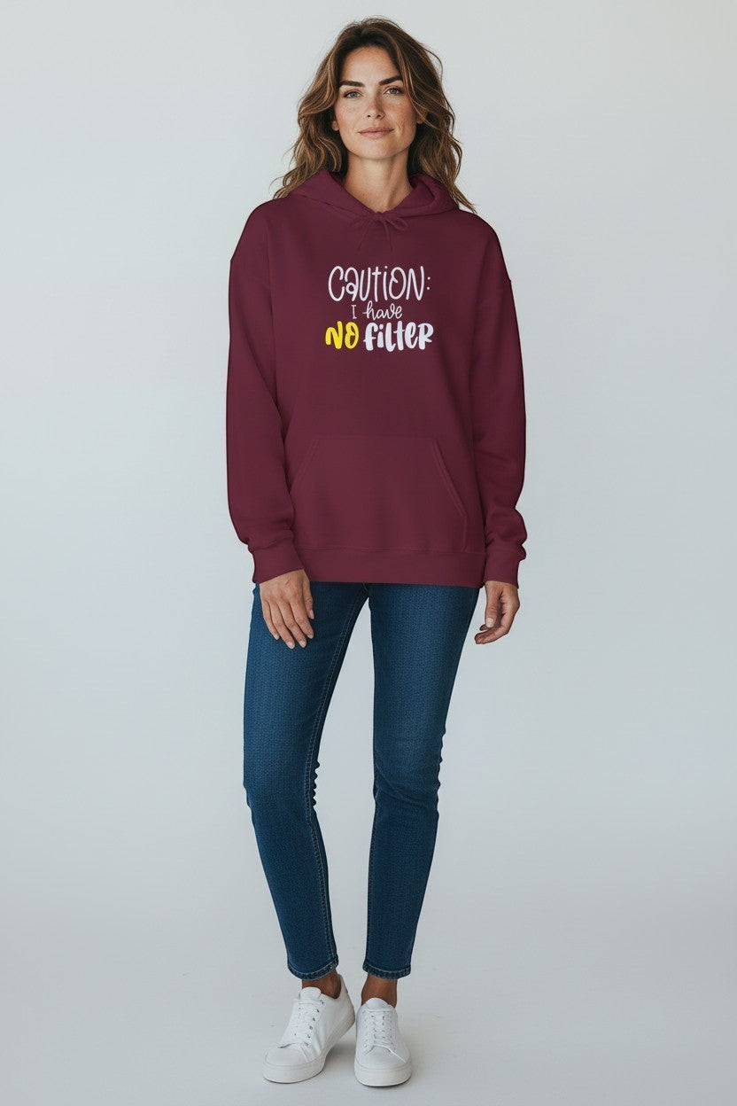 Woman wearing maroon “Caution I Have No Filter” hoodie, a cozy and playful sweatshirt for casual outfits.