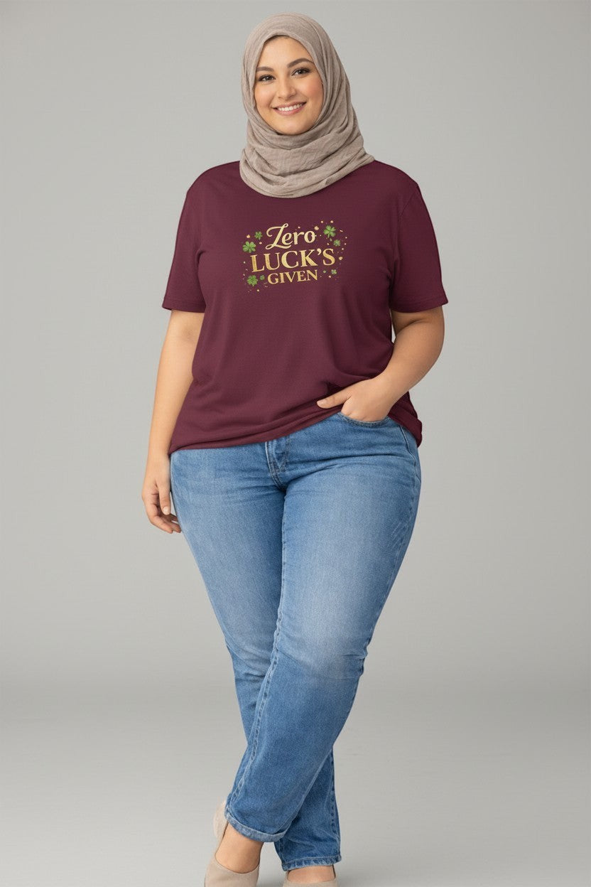 Woman wearing maroon “Zero Luck’s Given” shirt, a stylish and comfortable option for everyday outfits.