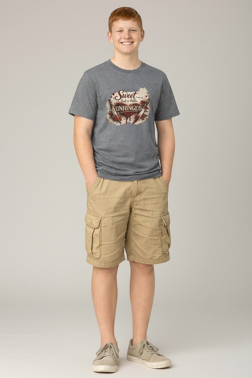 Man wearing charcoal “Sweet but a Little Unhinged” shirt, a funny unisex graphic tee for everyday wear.