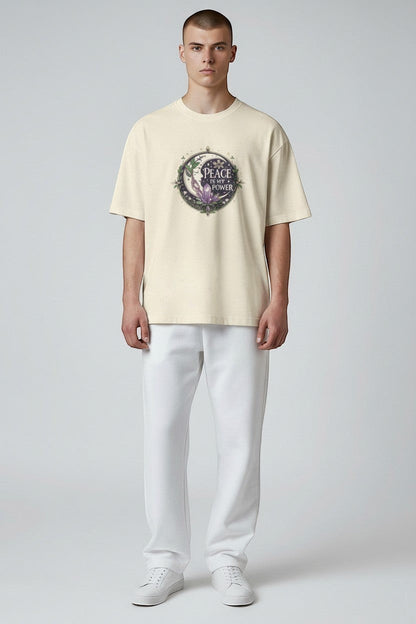 Man wearing natural peace affirmation t-shirt, a neutral and grounded everyday style.