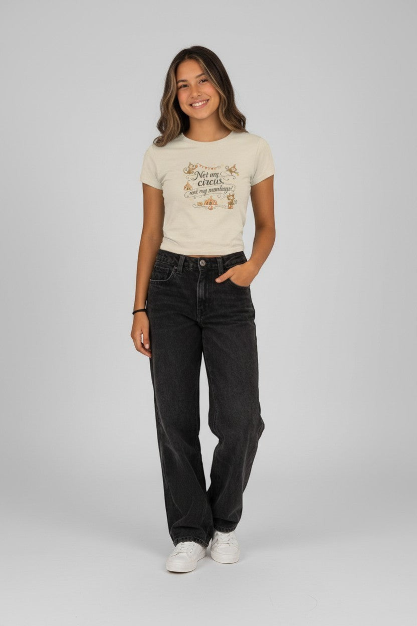 Woman wearing neutral beige “Not My Circus Not My Monkeys” t-shirt, a soft and relaxed casual look.