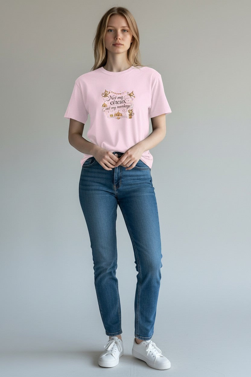 Woman wearing pink “Not My Circus Not My Monkeys” t-shirt, a playful and sarcastic everyday style.