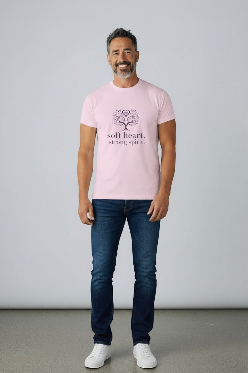 Man wearing pink “Soft Heart Strong Spirit” t-shirt, a unique and uplifting casual look.