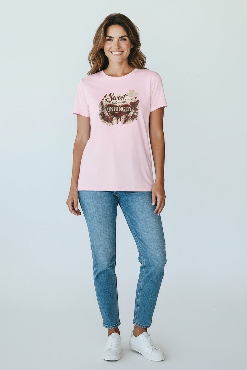 Woman wearing pink “Sweet but a Little Unhinged” shirt, a cute and playful tee for casual outfits.