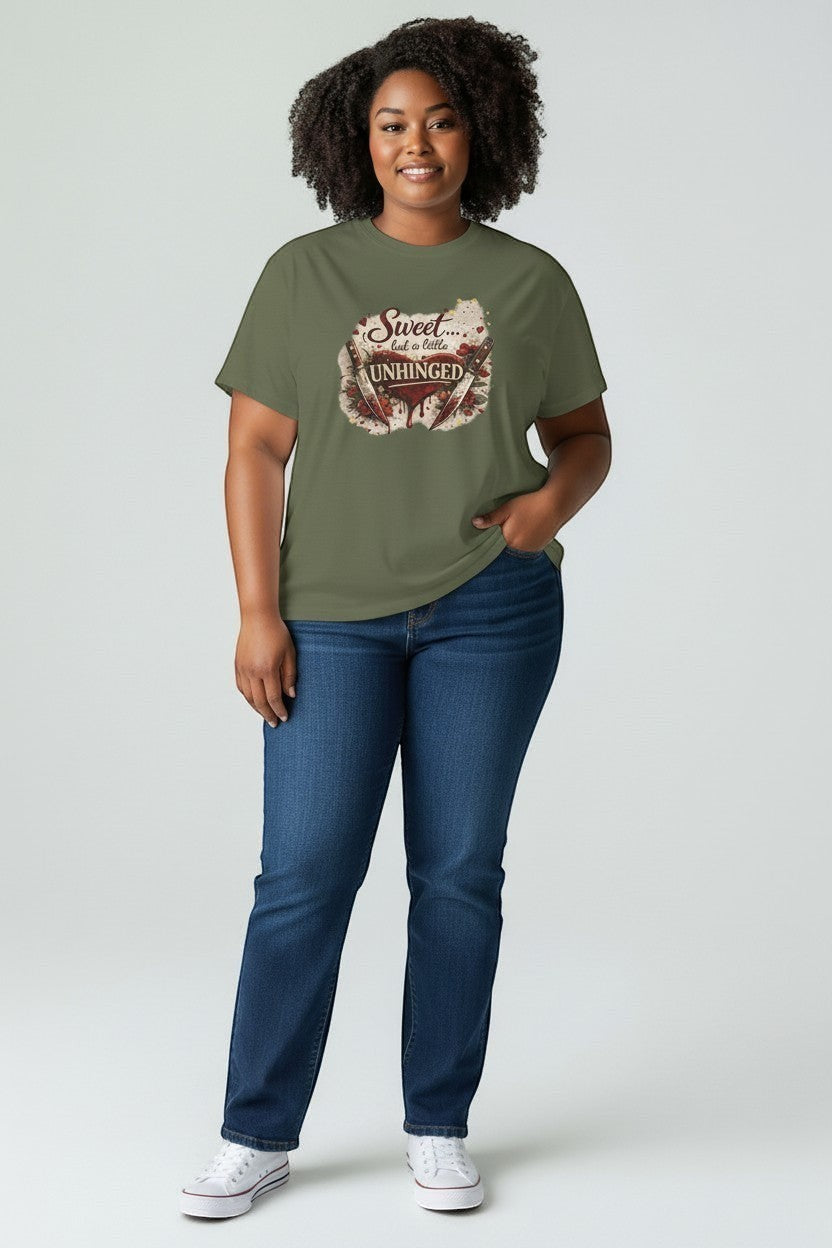 Plus size woman wearing “Sweet but a Little Unhinged” shirt, perfect for relaxed and confident everyday style.