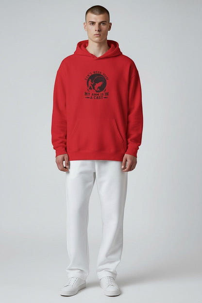 Man wearing red hoodie, a bold and eye-catching graphic sweatshirt for casual streetwear style.