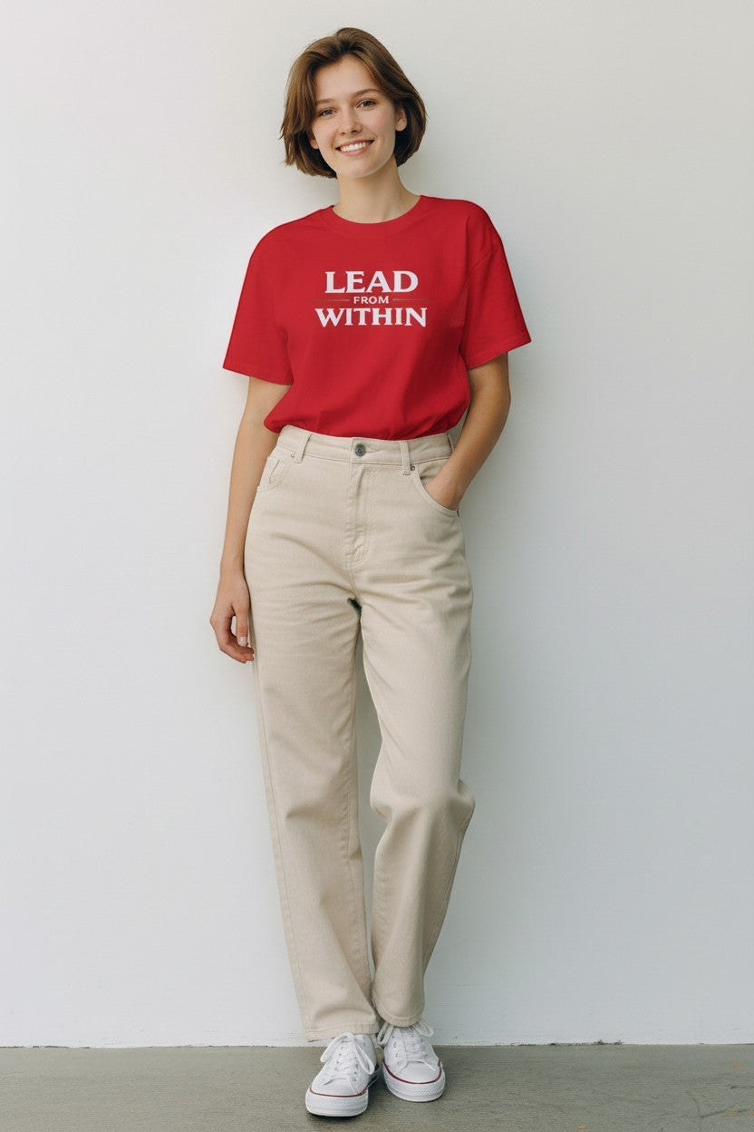 Woman wearing red “Lead From Within” t-shirt, a bold and confident everyday look.