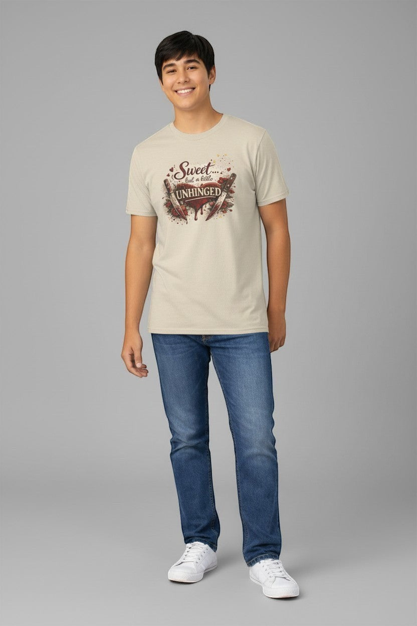 Man wearing sand-colored “Sweet but a Little Unhinged” shirt, a versatile everyday graphic tee.