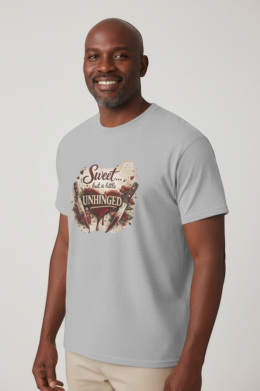 Man wearing sport grey “Sweet but a Little Unhinged” shirt, perfect for laid-back casual outfits.