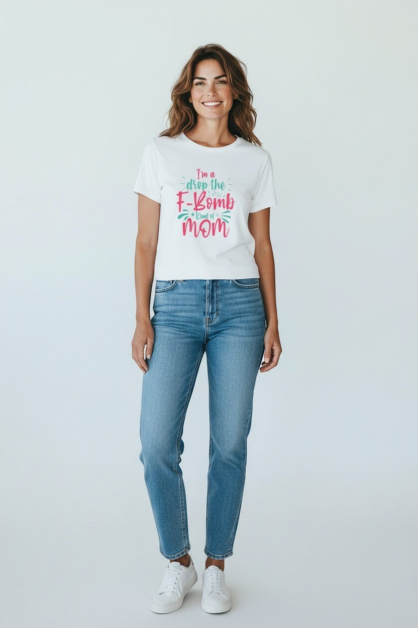 Woman wearing white “Drop the F-Bomb Mom” t-shirt, a fresh and fun outfit.