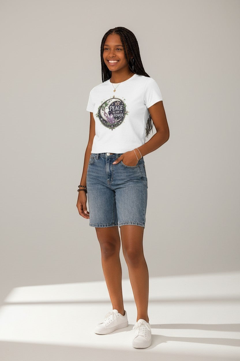 Woman wearing white peace quote t-shirt, a clean and simple mindful everyday look.