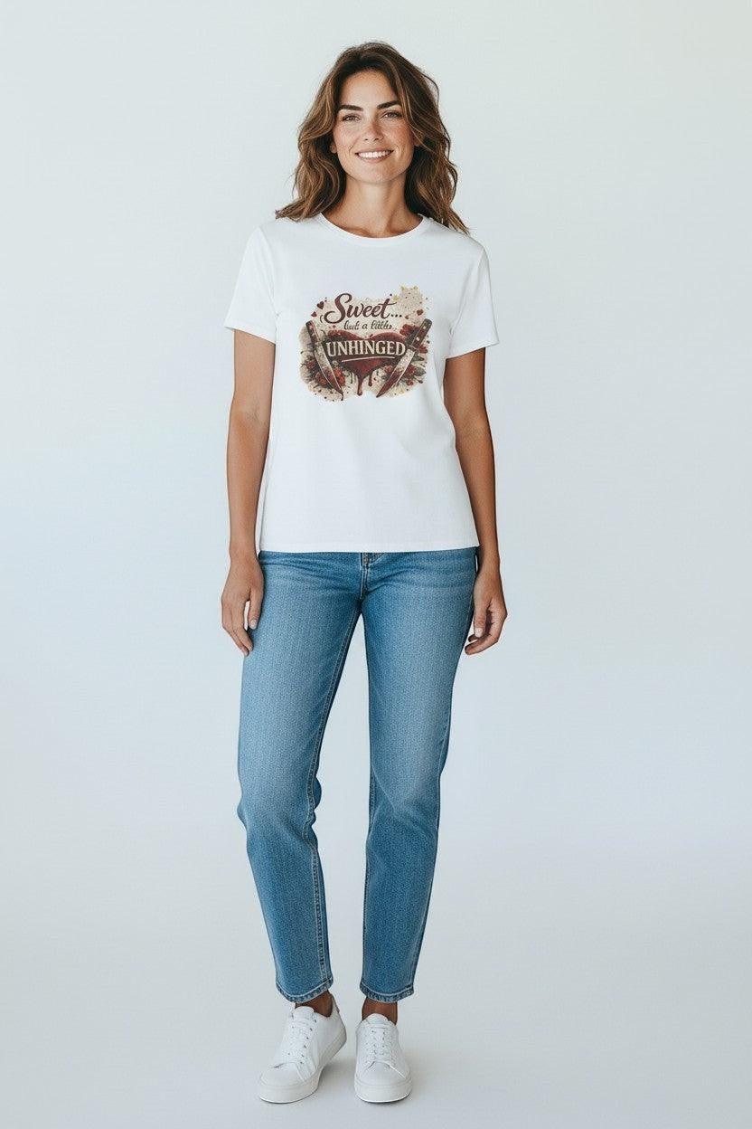 Woman wearing white “Sweet but a Little Unhinged” shirt, a clean and playful everyday tee.