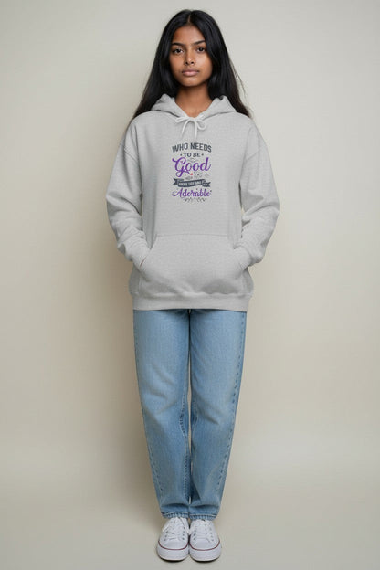 Woman wearing grey hoodie, a comfortable and stylish graphic sweatshirt for everyday wear.
