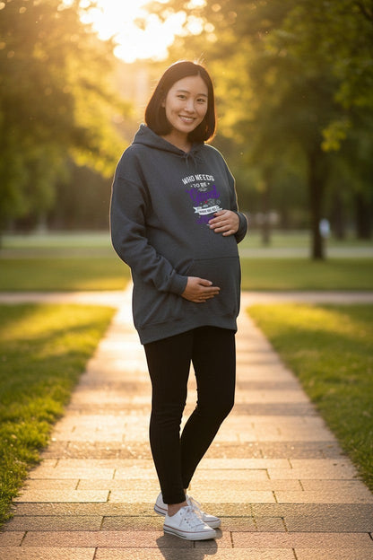Woman wearing cozy graphic hoodie outdoors, perfect for fall outfits and relaxed casual style.