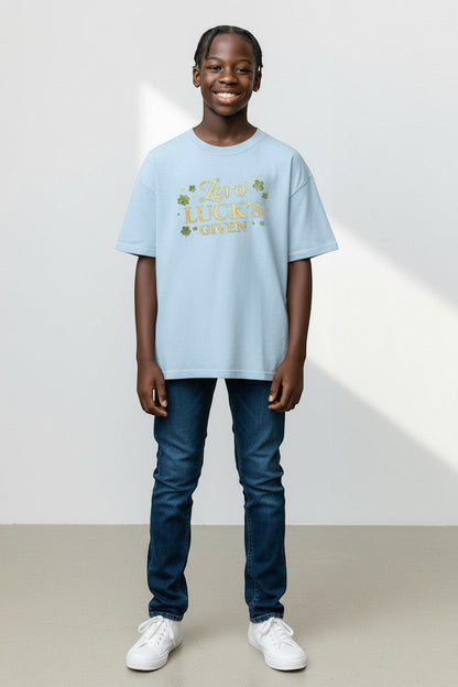 Youth wearing light blue “Zero Luck’s Given” t-shirt, a playful and casual graphic tee for everyday outfits.