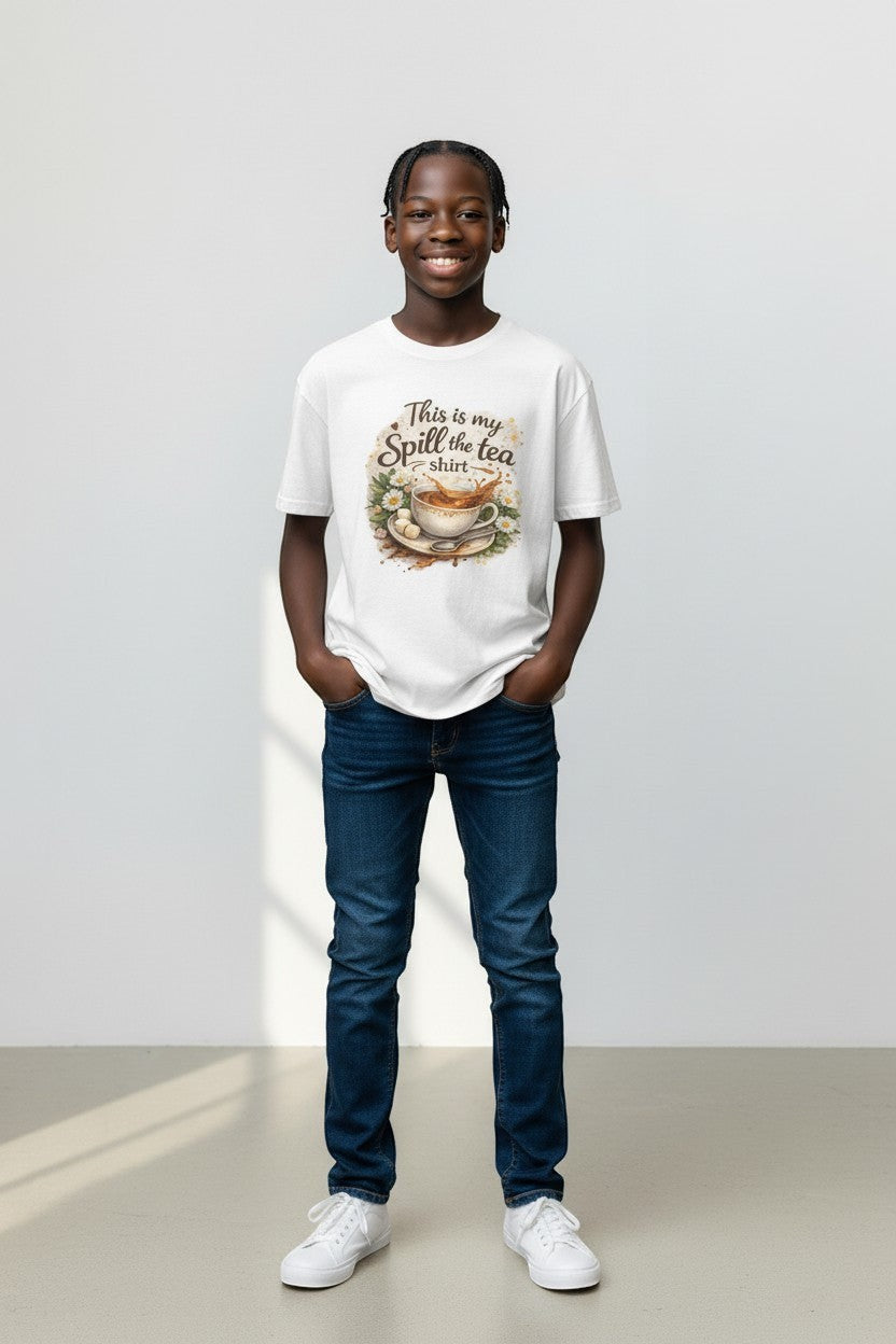 Youth wearing white “Spill the Tea” t-shirt, a fun and casual graphic tee for everyday style.