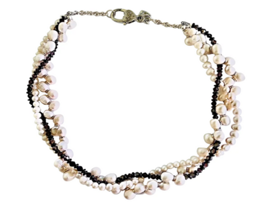 Freshwater pearl necklace is twisted with dark purple crystals and hematite disks