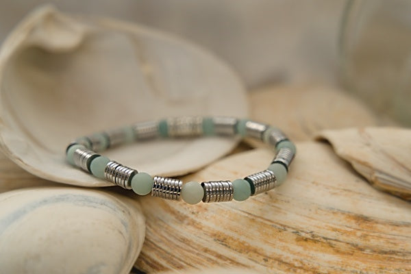 Amazonite & Hematite Stretch bracelet, blue-green beads on stretch cord with round hematite disk between the Matte Blue Amazonite