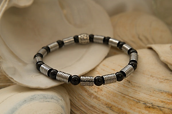 Black Onyx and Hematite Heishi Stretch Bracelet with Hematite disk and Black Onyx round beads.